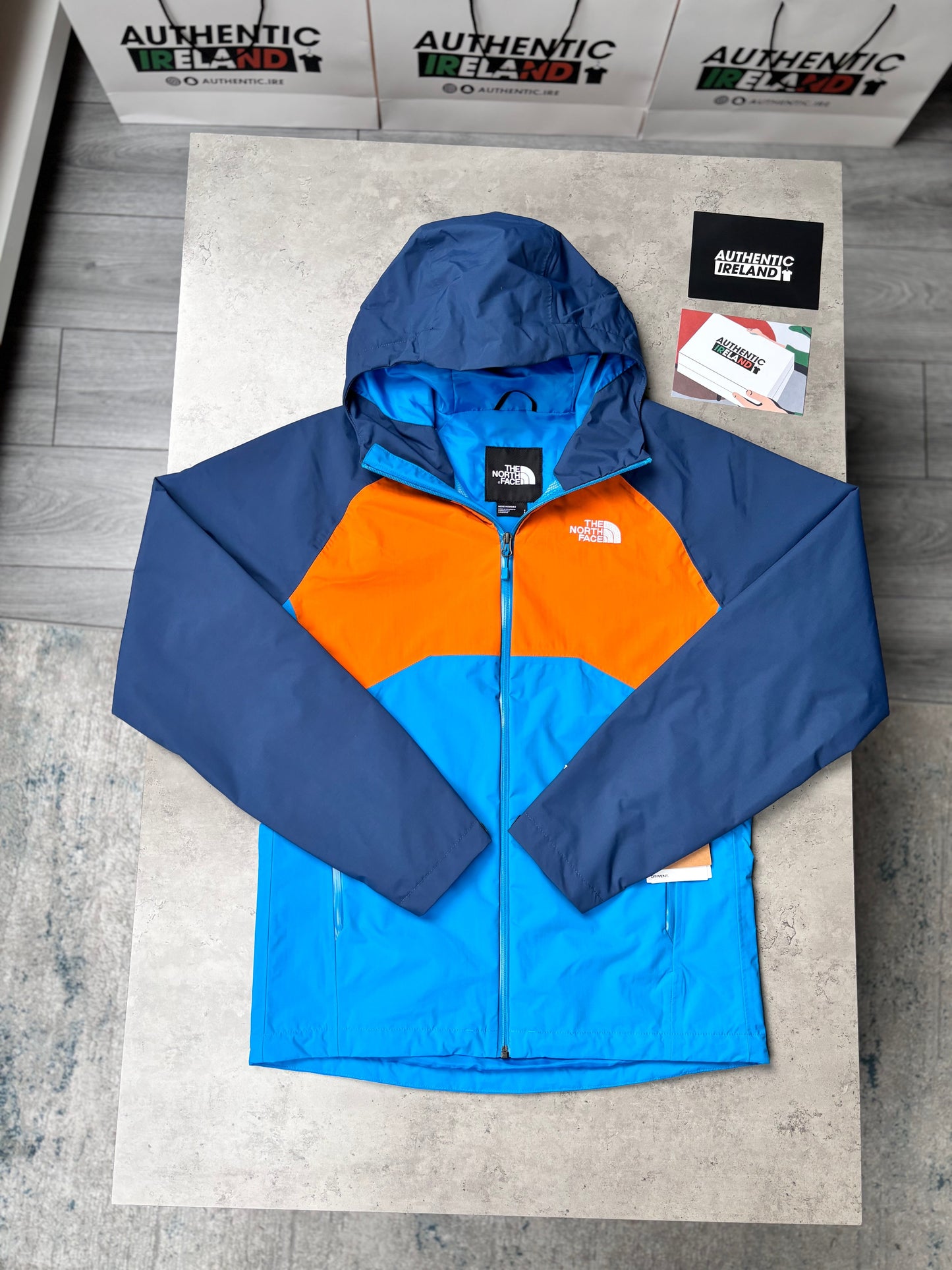 THE NORTH FACE RAIN JACKET - BLUE/ORANGE